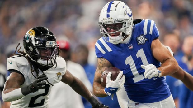 Jacksonville Jaguars safety Rayshawn Jenkins (2) chases after Indianapolis Colts wide receiver Michael Pittman Jr. (11) as he rushes in a touchdown Sunday, Sept. 10, 2023, during a game against the Jacksonville Jaguars at Lucas Oil Stadium in Indianapolis.  
